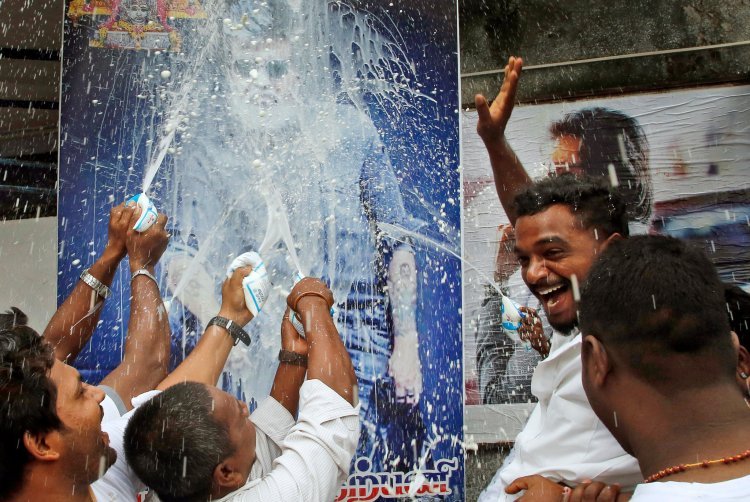 Rajinikanth's charm was such that fans were seen dancing and singing outside the theatre, anointed with milk
